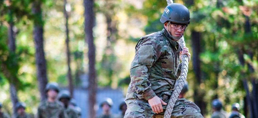 Trainees with the 197th Infantry Brigade complete the Sand Hill Confidence Course at Fort Benning, Ga., on November 16, 2021.