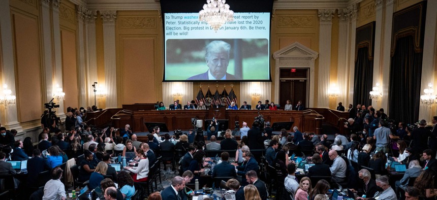 A tweet from former President Donald Trump is shown on a screen at the House Jan. 6 committee hearing in June.