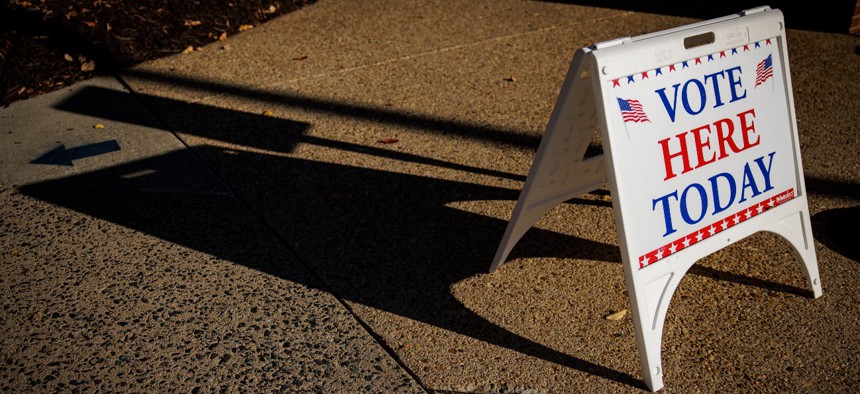 A sign sits outside of an early voting location at the Stafford County Government Center in Virginia on Nov. 3. 