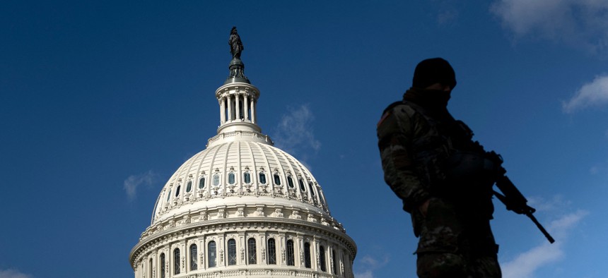 A member of the National Guard patrols the U.S. Capitol on March 4, 2021.