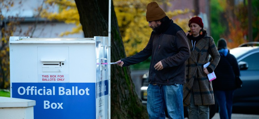 Voters cast their ballots at official ballot boxes on November 8, 2022 in Portland, Oregon. 