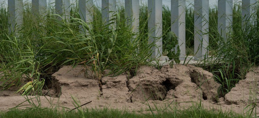 Erosion can be seen along a privately funded border wall in Mission, Texas, in June 2020.