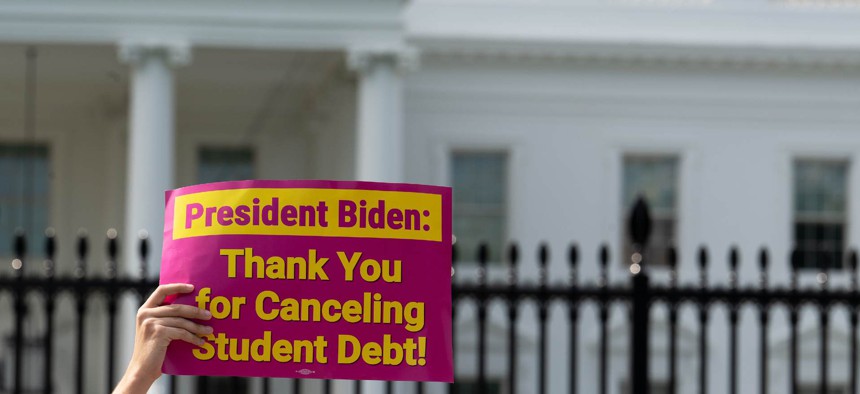  George Washington University student Kai Nilsen and other student loan debt activists rally outside the White House in August.