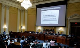 Excerpts from an email are displayed as Cassidy Hutchinson are shown during a hearing in June.