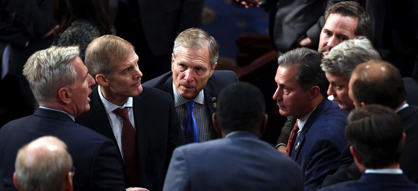US Representative Kevin McCarthy (R-CA) speaks to US Representative Jim Jordan (R-OH) and fellow members of the House, as voting continued for a new speaker at the Capitol in Washington, D.C., on January 6, 2023.