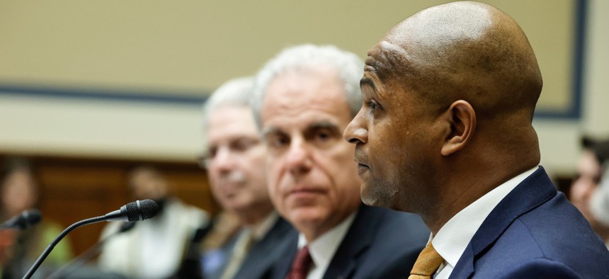 David Smith, (right), assistant director of the U.S. Secret Service's Office of Investigations;  Michael Horowitz, chair of the Pandemic Response Accountability Committee; and, Gene Dodaro, comptroller general and head of the Government Accountability Office during the House Oversight and Reform Committee hearing on Wednesday. The committee held the hearing to discuss COVID pandemic federal spending.