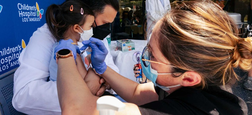 COVID-19 emergency status prompted coordinated vaccination efforts by health care providers, paramedics, volunteers and others.