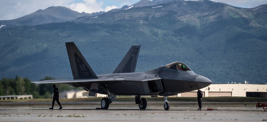 Members of the Air Combat Command F-22 Raptor Demonstration Team prepare to launch out a jet during a demonstration at Joint Base Elmendorf-Richardson, Alaska, July 10, 2020.