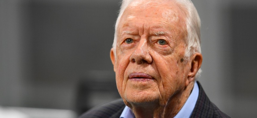 Former President Jimmy Carter, shown here prior to the game between the Atlanta Falcons and the Cincinnati Bengals at Mercedes-Benz Stadium on September 30, 2018 in Atlanta, Georgia.