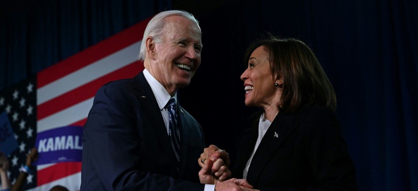 Harris and Biden embrace at the Democratic National Committee 2023 winter meeting in Philadelphia on Feb. 3.