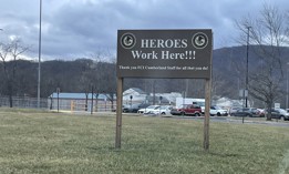 This sign greets visitors on the drive leading up to the federal correctional institution facility in Cumberland, Md. Staffing shortages have added to the stress of correctional officers across the federal prisons system, including those here. The bureau’s new director, Colette Peters, is trying to address this and other longstanding issues at the agency. 