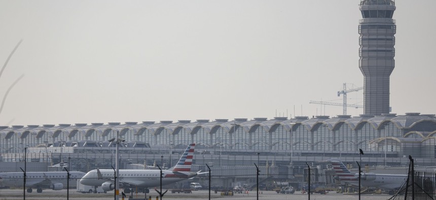A plane takes off in Washington, D.C., on Jan. 11 after flights throughout the U.S. were cancelled and delayed following an FAA outage that grounded planes.