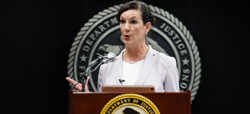 Bureau of Prisons Director Colette Peters delivers remarks after her swearing in ceremony at BOP headquarters on August 2, 2022. 
