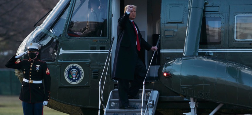  Donald and Melania Trump board Marine One as they depart the White House on January 20, 2021.
