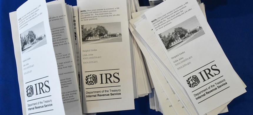 Informational brochures lay out at an Internal Revenue Service job fair on March 31, 2022 in Clearfield, Utah. IRS plans to bring on about 10,000 new employees in the current fiscal year.