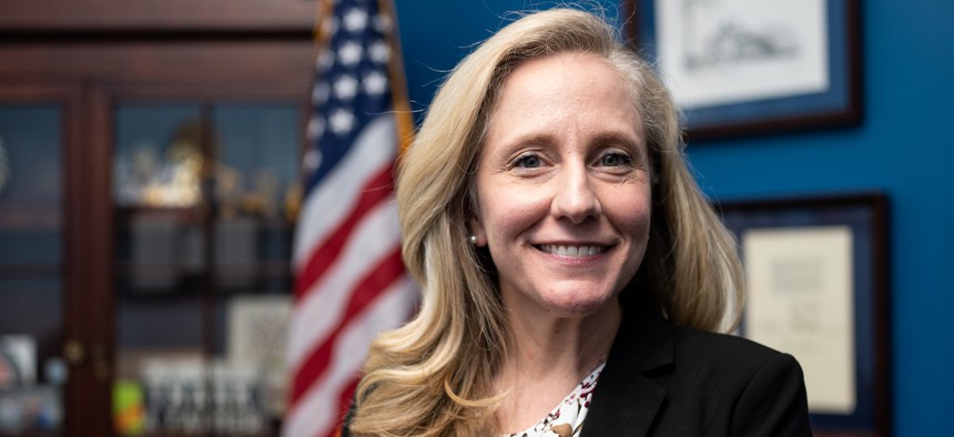 Rep. Abigail Spanberger, D-Va., poses in her office on March 22, 2023. Spanberger’s office set up an informal survey of federal workers and retirees on the issue this week.