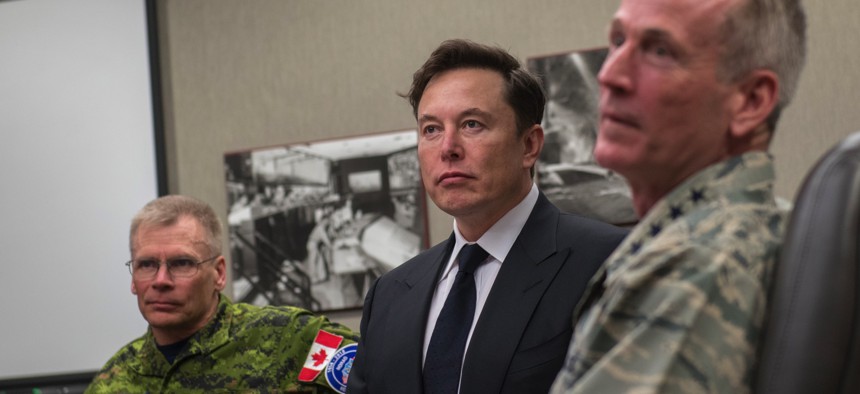 SpaceX CEO Elon Musk discusses U.S. space operations with NORAD commander U.S. Air Force Gen. Terrence O’Shaughnessy, and his deputy, Royal Canadian Air Force Lt. Gen. Christopher Coates, in Colorado Springs, Colo., on April 15, 2019.