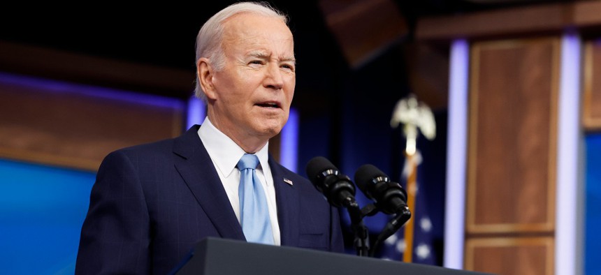 President Biden gives remarks on new airline regulations his administration is pursuing during an event on May 8. Biden issued an executive order on May 9 ending the COVID-19 vaccine mandates for federal workers and contractors. 
