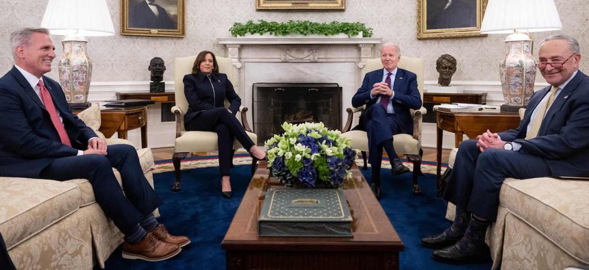 From left to right: Speaker of the House Kevin McCarthy, R-Calif., Vice President Kamala Harris, President Biden and Senate Majority Leader Chuck Schumer, D-N.Y., met in the Oval Office to continue negotiations over the debt ceiling on May 16, 2023. 