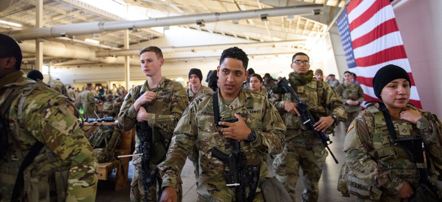 82nd Airborne soldiers prepare to deploy to Poland on February 14, 2022, at Fort Bragg, in Fayetteville, North Carolina.