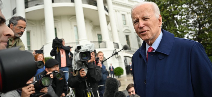 President Biden speaks to members of the media before boarding Marine One on the South Lawn of the White House in May. Lawmakers are urging Biden to nominate people to fill long-vacant watchdog jobs. 