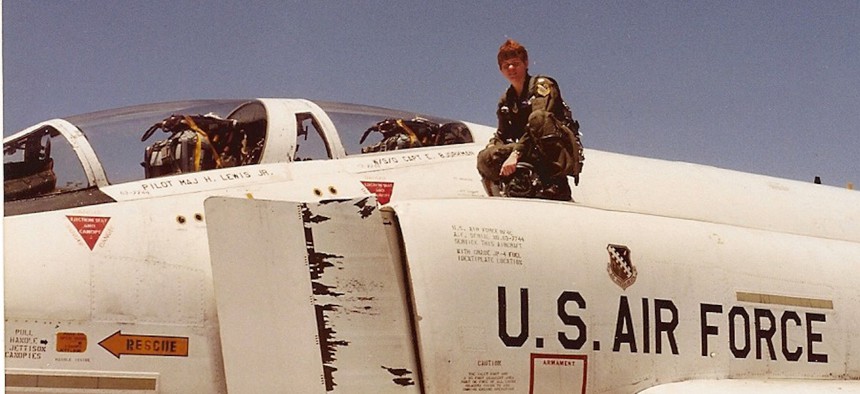 The author, now the executive director of the Air Force Test Center, poses on an RF-4C tactical reconnaissance jet at Edwards Air Force Base, California, in 1988.