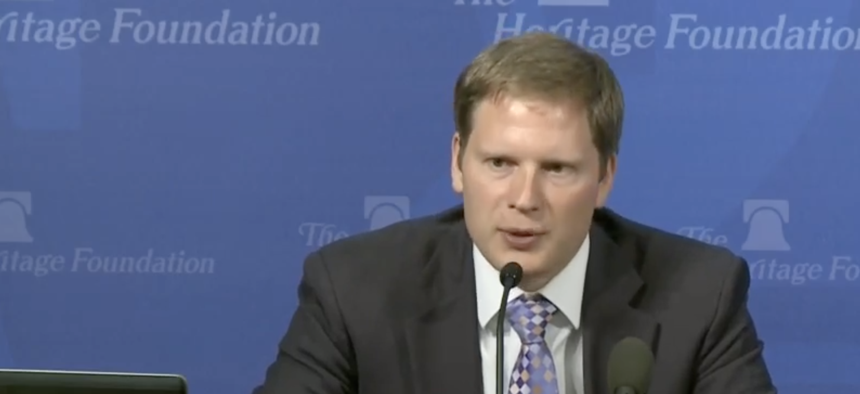  James Sherk, former special assistant to President Trump, shown here during a 2016 Heritage Foundation event. Sherk defended Schedule F at a panel discussion hosted by the National Academy of Public Administration on June 29. 