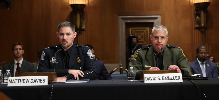 Matthew Davies (left), executive director for Customs and Border Protection’s admissibility and passenger programs, and David Bemiller, Border Patrol’s chief for law enforcement operations, testify during a Senate Homeland Security and Government Affairs subcommittee hearing on Title 42, on Sept. 6, 2023.