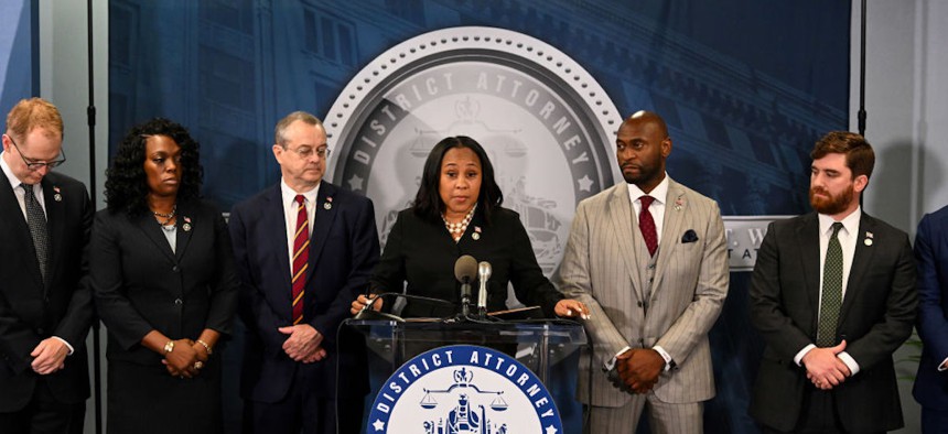 Fulton County District Attorney Fani Willis speaks during a news conference at the Fulton County Government building on Aug. 14, 2023, in Atlanta, Georgia. Willis spoke about the 13 charges former President Donald Trump received after a Georgia grand jury indicted him on charges for interfering with Georgia's election results in 2020.