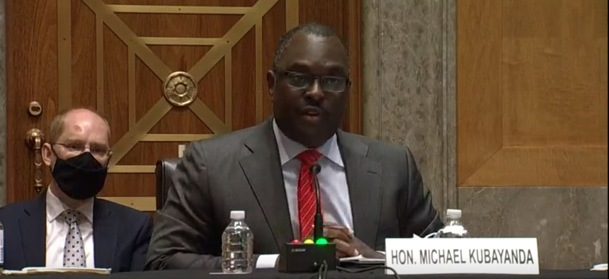 Postal Regulatory Commission Chairman Michael Kubayanda, shown here testifying at a hearing in November 2021. Kubayanda suggested the postal board was improperly interfering with the commission’s operations by not giving it  the money it needs to meet demands.