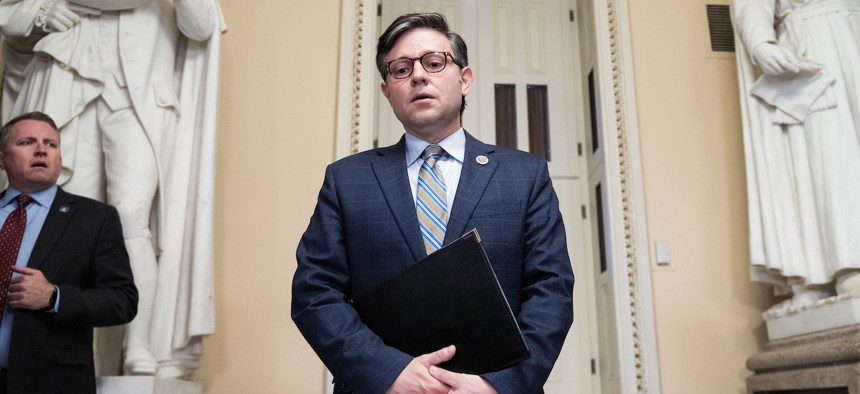 Speaker of the House Mike Johnson, R-La., prepares to make a statement in the U.S. Capitol on the mass shooting in Lewiston, Me., on Oct. 26, 2023.