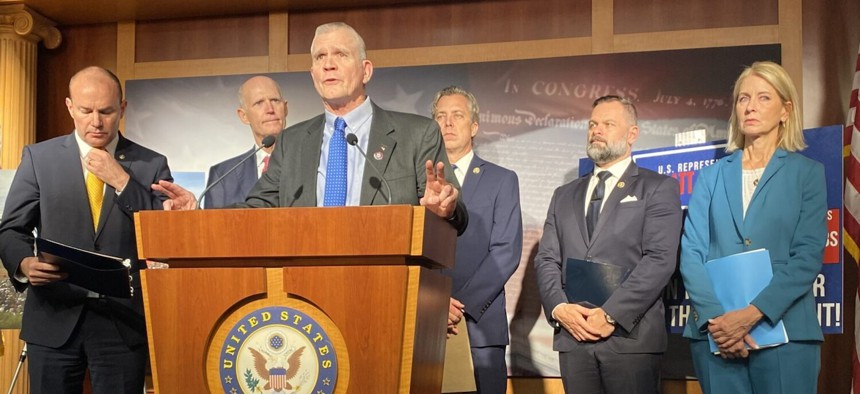 Rep. Matt Rosendale, R-Mont., speaks during a press conference inside the U.S. Capitol on immigration and border policy on Jan. 10, 2024. Also pictured from left are Utah Sen. Mike Lee, Florida Sen. Rick Scott, Tennessee Rep. Andy Ogles, Florida Rep. Cory Mills and Illinois Rep. Mary Miller. 