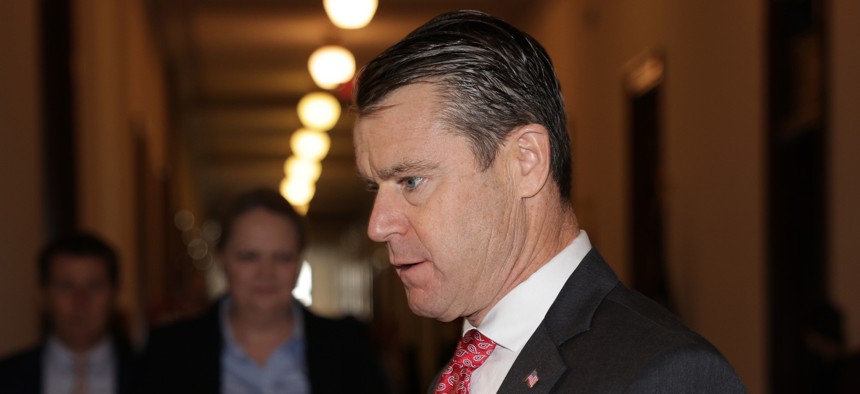 Indiana Republican Sen. Todd Young, shown here arriving at one of the Senate's AI meetings in September 2023, is looking to expand the federal government's capacity to understand global technology capabilities and competitiveness.