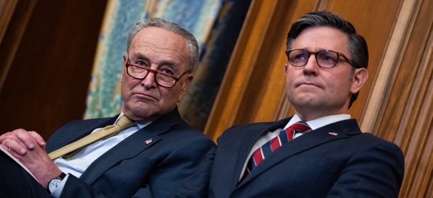 Senate Majority Leader Charles Schumer, D-N.Y., left, and Speaker of the House Mike Johnson, R-La., are continuing last-minute negotiations to fund the federal government ahead of an initial March 1 deadline. 