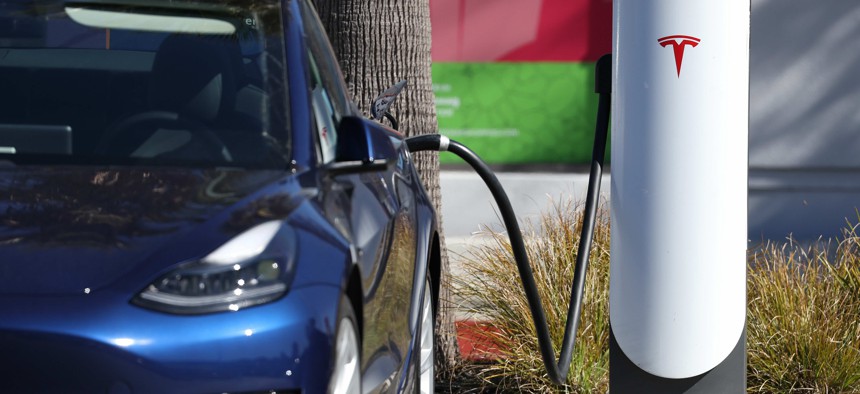 The Federal Highway Administration posted a request for information calling for details about how automakers will adopt Tesla-style plugs and chargers in an electric vehicle infrastructure. 