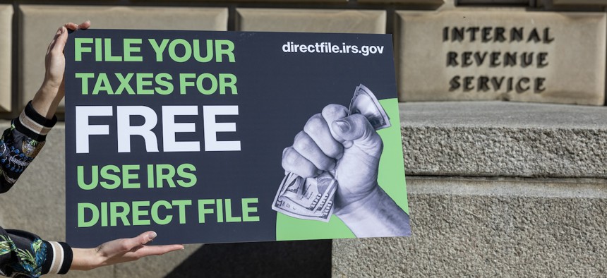 People use IRS Direct File at the Internal Revenue Service Building on April 5, 2024.