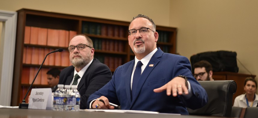 Education Secretary Miguel Cardona (R) testifies before the House Appropriations Subcommittee on the Department of Education fiscal 2025 budget at Capitol Hill on April 10, 2024.
