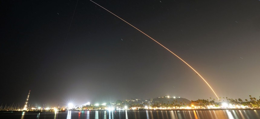 A SpaceX Falcon 9 rocket launches with 20 Starlink satellites to low-Earth orbit from Vandenberg Space Force Base as the International Space Station (ISS) intersects the flight path on May 9, 2024, in Lompoc, California.