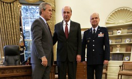 President George W. Bush, left, with John Negroponte, center, and Mike Hayden in the Oval Office in April 2005.