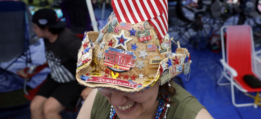 A woman decorates her hat every year in honor of military veterans and Gold Star families. Veterans make up roughly 30% of the federal workforce, with approximately 300,000 veterans currently employed by the federal government.