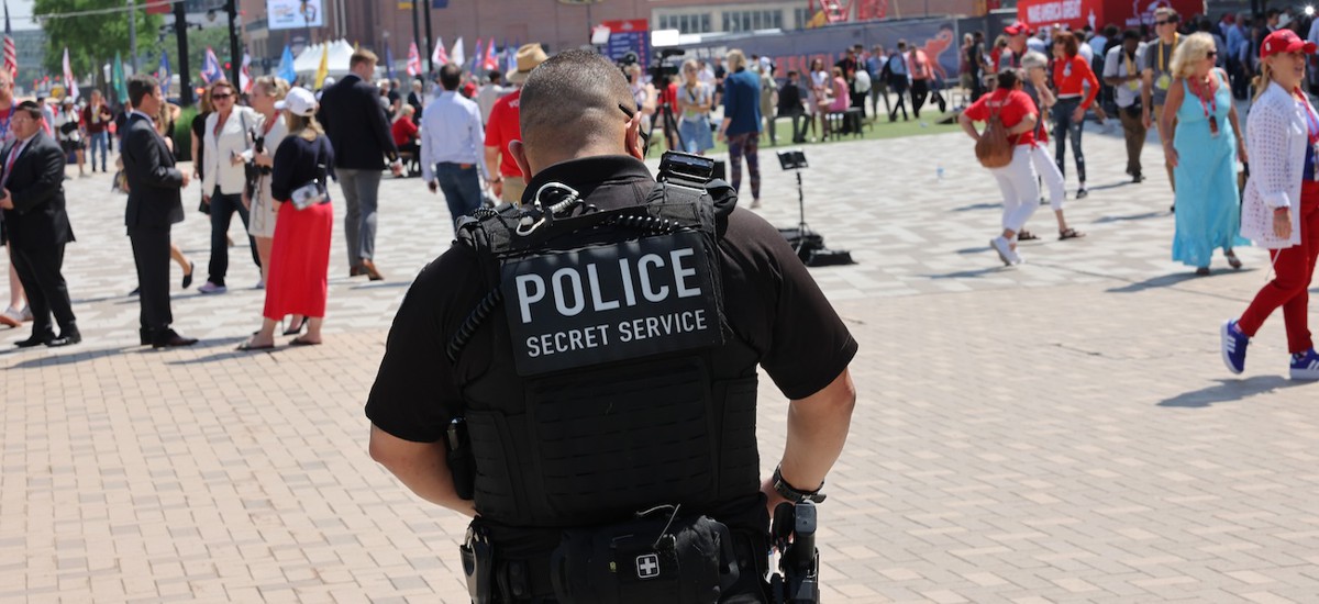 A Secret Service officer patrols the grounds of the 2024 Republican National Convention at the Fiserv Forum on July 16 in Milwaukee. 