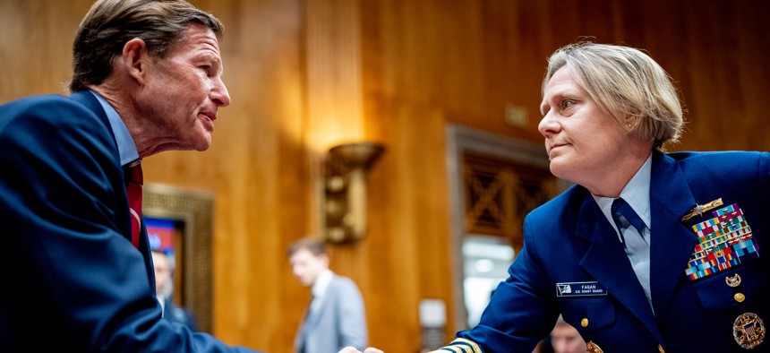 U.S. Coast Guard Commandant Linda Fagan speaks with Sen. Richard Blumenthal, D-Conn., before a hearing on Capitol Hill on June 11, 2024. Fagan has ordered numerous actions to improve the Coast Guard's culture since Operation Fouled Anchor was exposed.