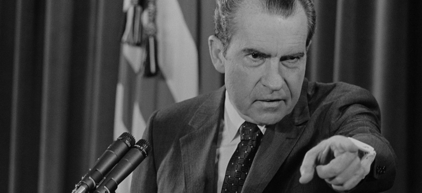 President Richard Nixon pointing during a December 1970 press conference. The Nixon-era Federal Political Personnel Manual bears striking similarities to the Trump-era Schedule F plan.