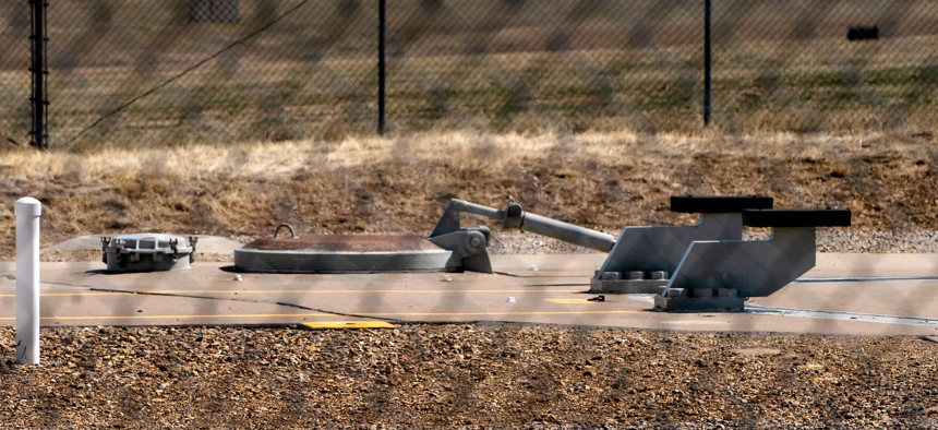 The top of a Minuteman III missile silo in the middle of a ranch in Montana. Many of the missile silos are located on private land across the Great Plains region.