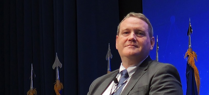 Andrew Hunter, assistant Air Force secretary for acquisition, technology and logistics, speaks to an Air Force Research Laboratory audience at Wright-Patterson Air Force Base, Ohio, in November 2023.