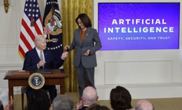 President Joe Biden signs the executive order on AI in October 2023. A recent oversight report found that federal agencies have met initial management and talent benchmarks to support wider adoption of AI.