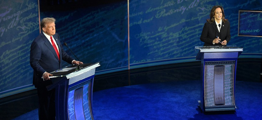 Vice President and Democratic presidential candidate Kamala Harris and former president and Republican presidential candidate Donald Trump attend a presidential debate at the National Constitution Center in Philadelphia.