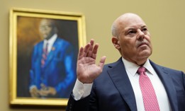 Postmaster General Louis DeJoy, pictured here at May 2023 House Oversight hearing, told lawmakers Thursday that the USPS would ensure timely delivery of mail-in ballots amid paused reform efforts. 