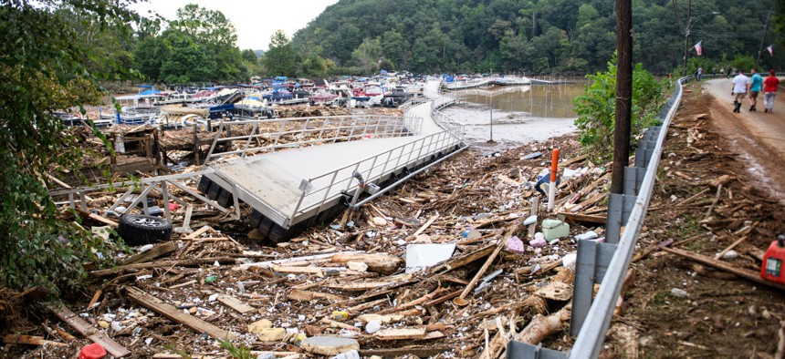 The Rocky Broad River flows into Lake Lure and overflows the town with debris from Chimney Rock, North Carolina after heavy rains from Hurricane Helene on Sept. 28, 2024, in Lake Lure, North Carolina.