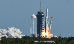 CAPE CANAVERAL, FLORIDA, UNITED STATES - OCTOBER 14: A SpaceX Falcon Heavy rocket carrying the Europa Clipper spacecraft lifts off from pad 39A at the Kennedy Space Center on October 14, 2024 in Cape Canaveral, Florida. The four-year mission will study Europa, one of Jupiter's four largest moons which is believed to have a saltwater ocean beneath its surface, hoping to discover an environment where life could exist beyond Earth.